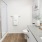 bathroom with shower, sink, toilet