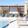 Cabanas with seating and pool